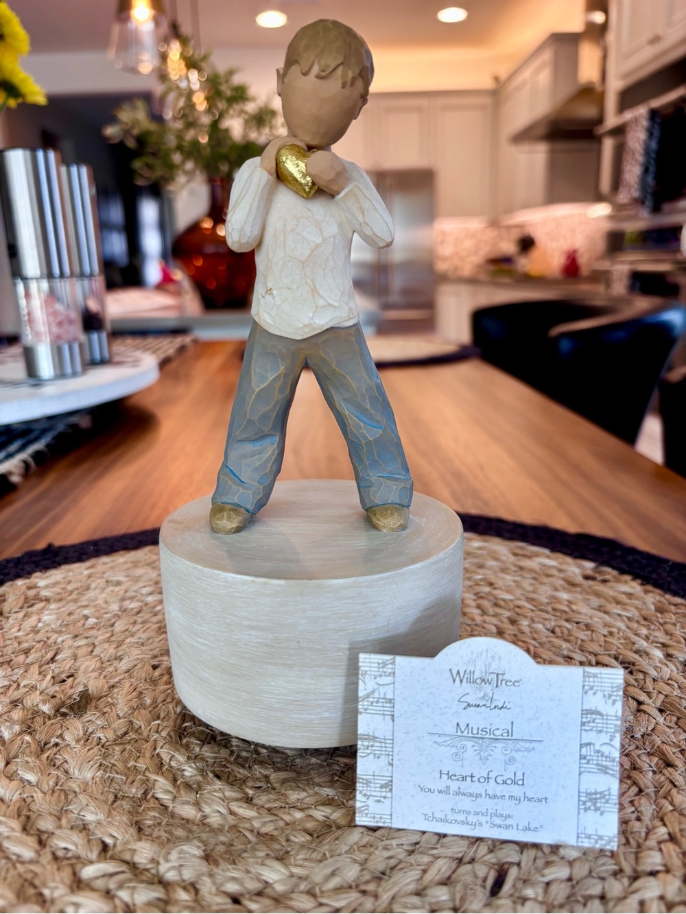 Willow Tree Figurine Holding Gold Heart in Neutral and Blue Tones